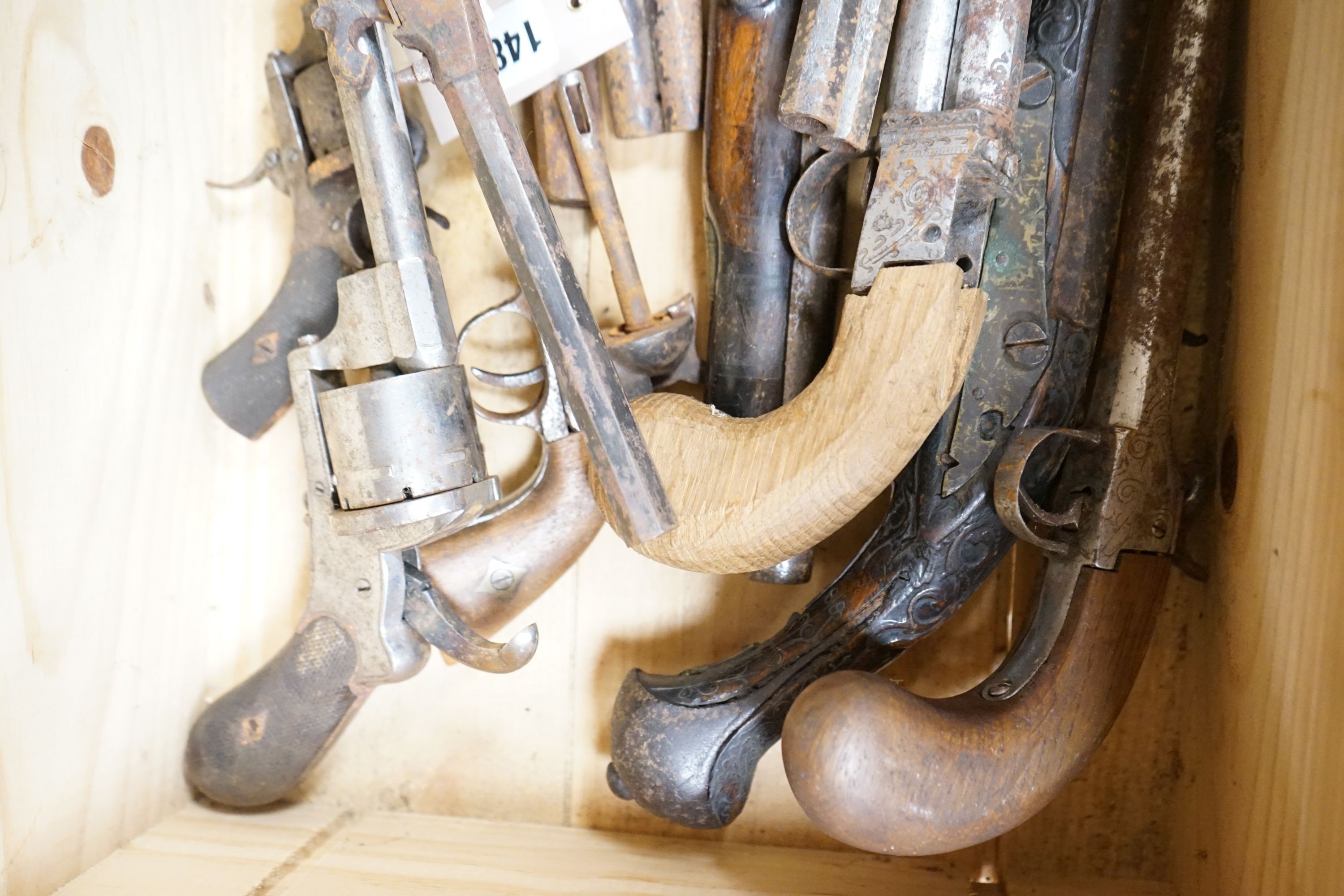 A group of percussion cap pistols and pin fire revolvers, 19th century, for restoration.